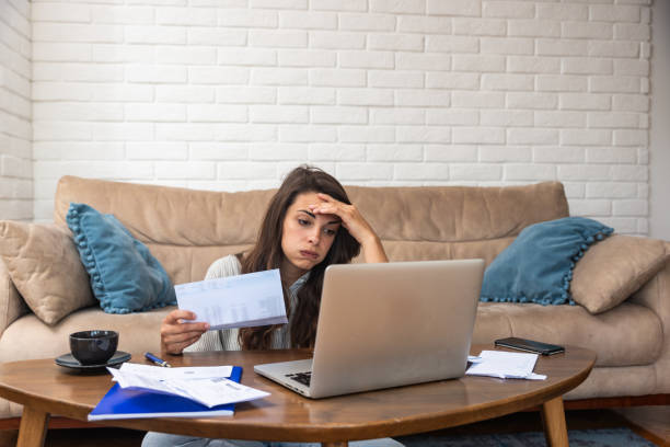 How To Pay Off Student Loans Faster Now In 2024 2 A person reviewing a financial aid letter outlining various student loans type.