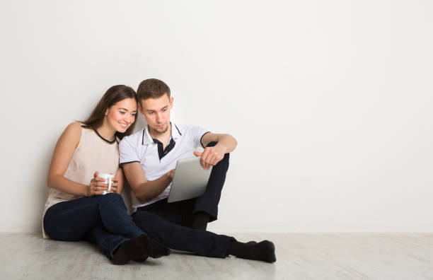The Power of Hello: Free Verse Poem 3 Two people sitting together, one sad, the other offering a comforting smile. all started with "Hello"