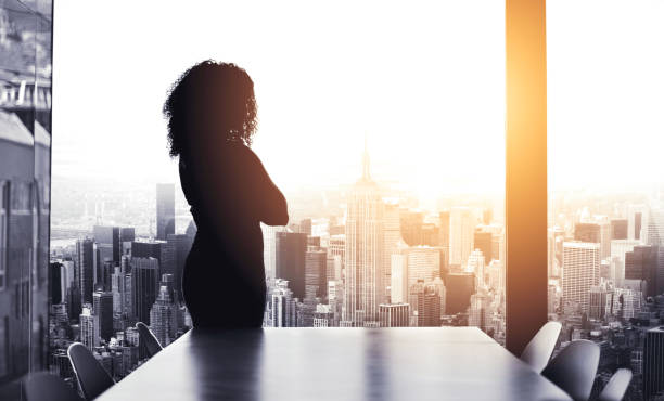 A Prisoner of Her Thoughts - Free Verse Poem - Person looking out at stormy sky, reflecting on life