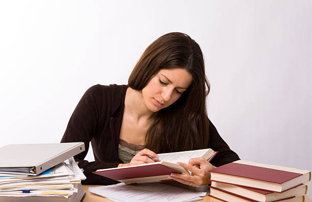 A Prisoner of Her Thoughts - Old letters and photos scattered on a table