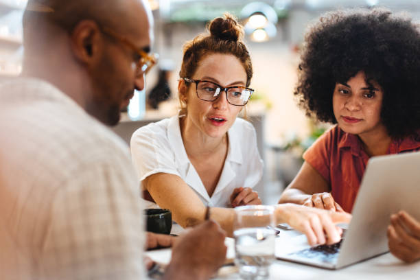Diverse people collaborating, symbolizing the importance of community and support in finding purpose