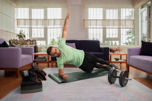 How to create a budget-friendly home gym 2 Performing lunges with adjustable weights in a budget-friendly home gym.