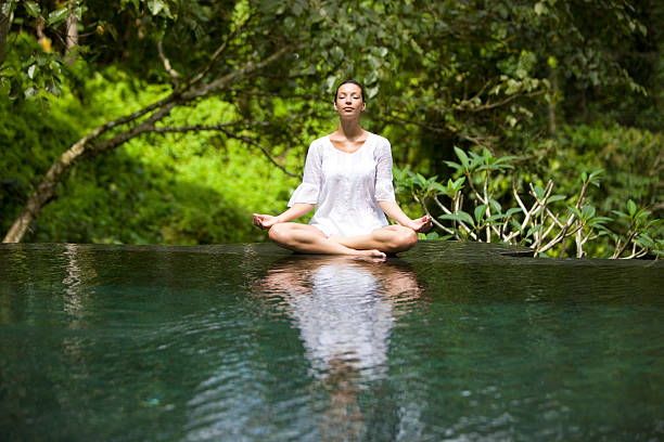 How Meditation Helps Now at Home 2 Meditation: Person meditating outdoors in nature