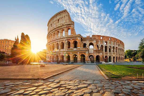 The ruins of a castle bathed in morning sunlight as the mist lifts, representing the resolution of a love lost in time